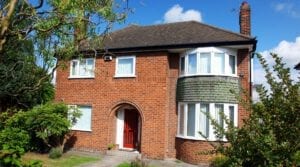 Modern detached house with driveway, a popular UK property type